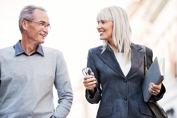 istock Business people walking outdoors and communicating. 174781231