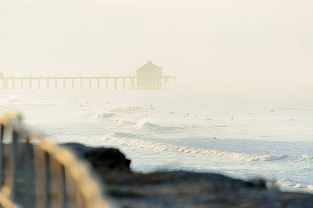 istock Huntington Beach surfers at sunrise 174781638