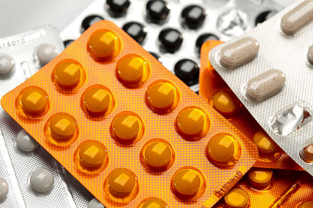 aprovisionamiento médico, comprimidos y de las cápsulas - hormone therapy hrt pill medicine fotografías e imágenes de stock