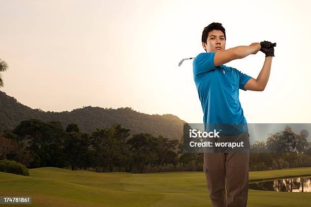 Golfista Swing Foto de stock y más banco de imágenes de Golf - Golf, Asia, Etnias asiáticas e indias