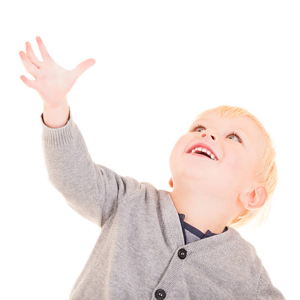 istock Cute boy is trying to catch something 174783276