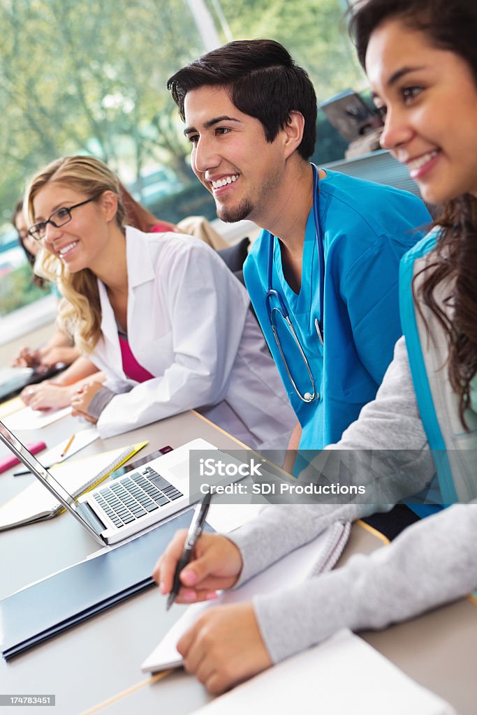 Happy nursing or medical school students listening in college classroom Medical Student Stock Photo