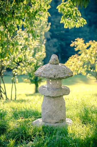 stone figure in a zen garden