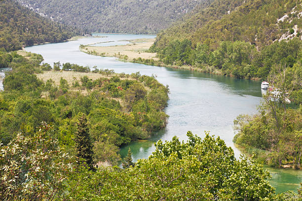 istock quiet river with streaming water and rocks  Croatia Krka 174783581