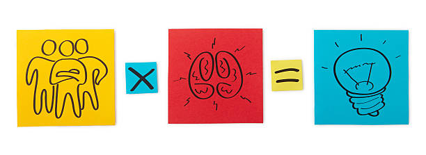 Concept of creative team. Colored paper sheets.