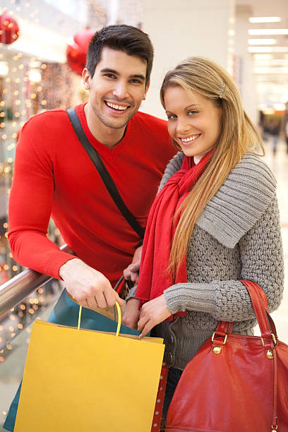 istock Young couple in shopping mall. 174784249
