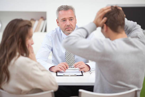 istock Couple with consultant 174784330