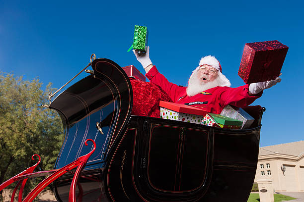 istock Hohoho Real Santa in Sleigh with Christmas Presents 174784621