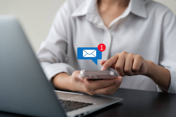 istock Email notification, businesswoman using smartphone with email notification icons, technology, internet, connection and innovation. 1747850182