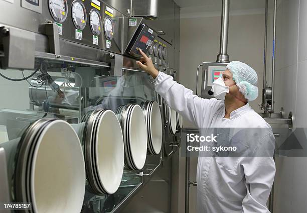 Worker Set Big Glove Box Machine In Pharmaceutical Factory Stock Photo - Download Image Now