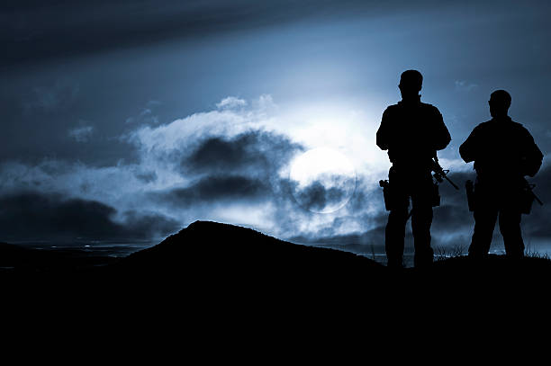 istock Army Soldiers on Guard at Night 174785171