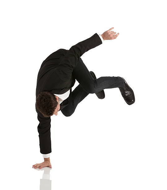 geschäftsmann, stehen auf einer seite. - flexibility business gymnastics exercising stock-fotos und bilder