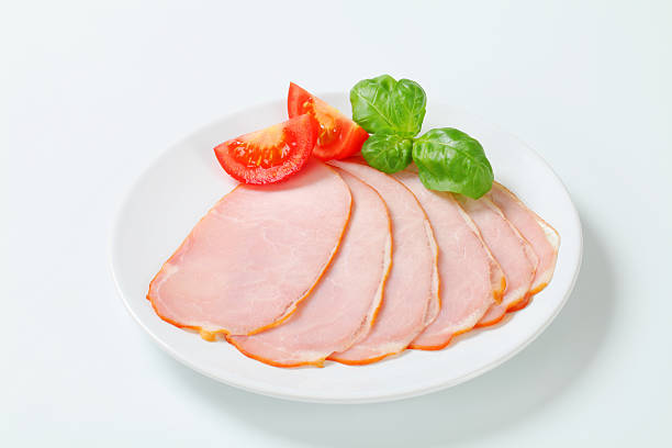 istock Slices of ham with basil and tomato 174785559