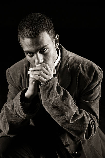 istock Black and white portrait young man in old-fashioned jacket 174785720
