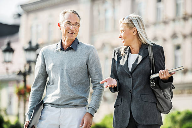 istock Business people walking outdoors and communicating. 174786328