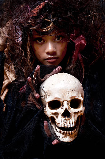 Serious Woman (Witch Doctor or Priestess) with a Skull - Shot at Raliegh'Lypse 2012