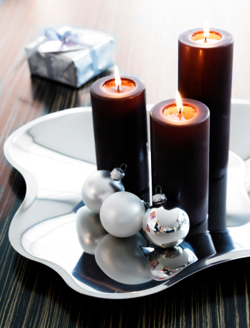 Candles and decorations at silverplate