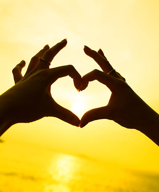 istock Heart Shaped Hands in the Sky 174787284