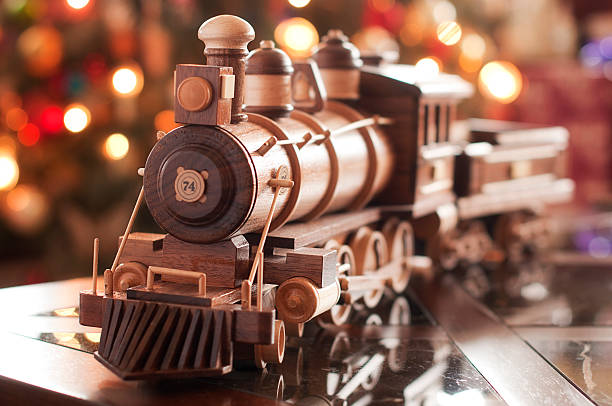 istock Wooden Train and Christmas lights 174787373