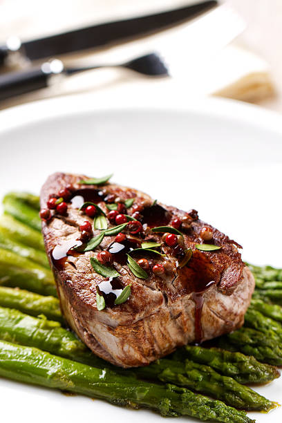 istock Beef fillet with pink pepper and asparagus 174788227
