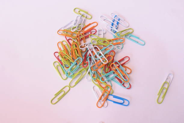 istock close up colorful paper clips on white background 1747884240