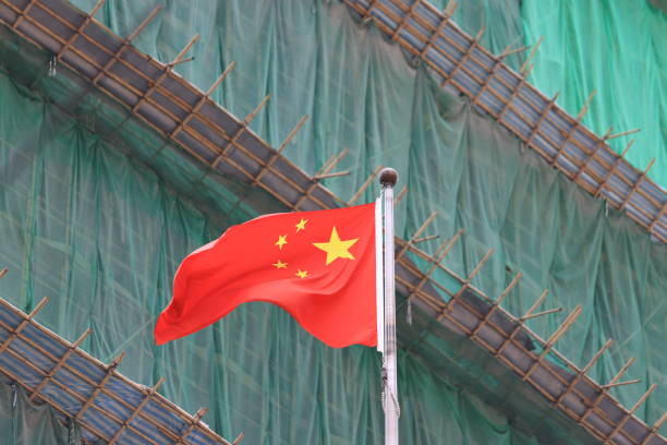 istock chinese flag with the construction site background 1747884248