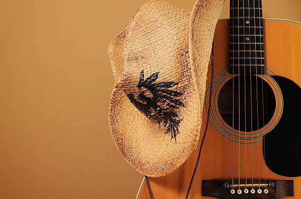 istock Acoustic Guitar and Cowbody Hat 174788683