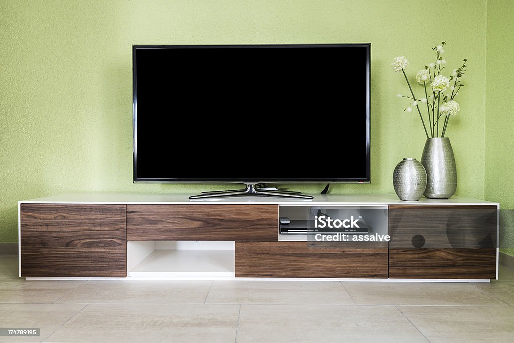 Modern living room with 55 inch TV and accessories entertainment electronics in a modern living room Television Set Stock Photo