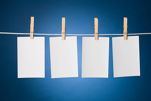 istock Paper sheet on a clothes line 174789585