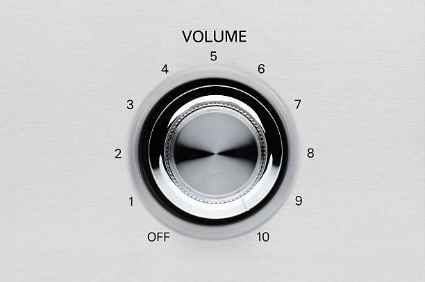 Adjustable volume knob with values ranging from off to 10 A chrome volume knob turned all the way to 10. knob photos stock pictures, royalty-free photos & images