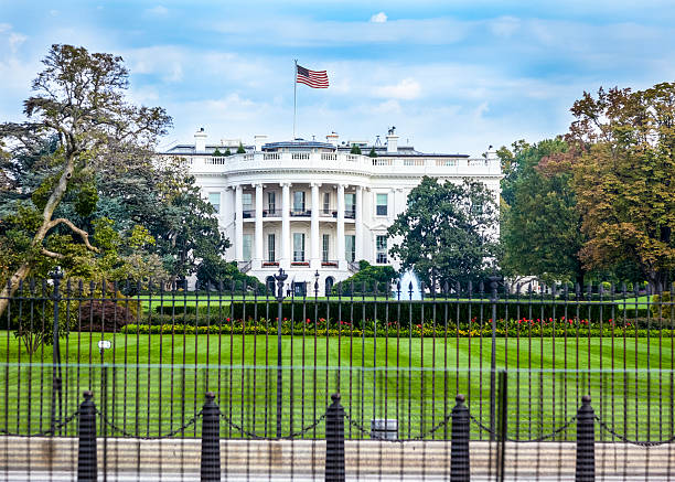 istock White House South Facade with Flag Catching a Breeze 174790169