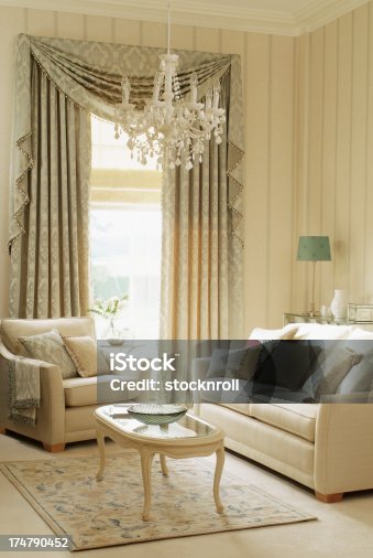 istock Interior of three seater sofa and chair in living room 174790452