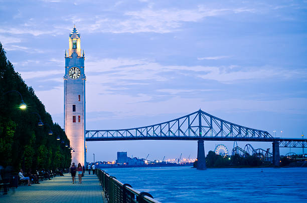 istock Montreal Clock Tower at night with walkway in Quebec, Canada 174790753