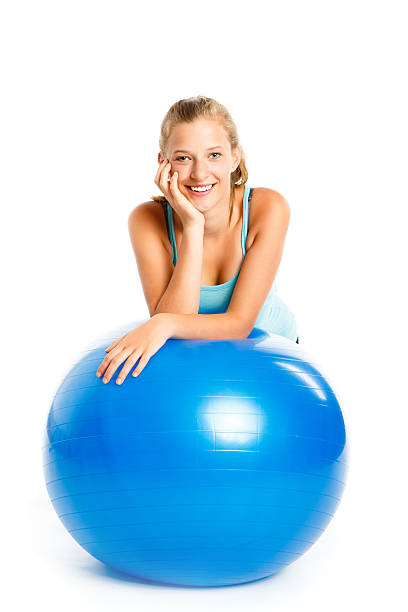 istock Young woman exercising isolated on white 174791642