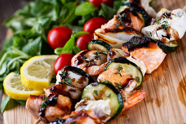 istock Fish skewers with salad 174791819