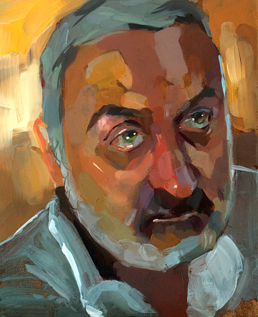 Oil portrait of a man of a certain age with green and pensive eyes on yellow and orange abstract background.
