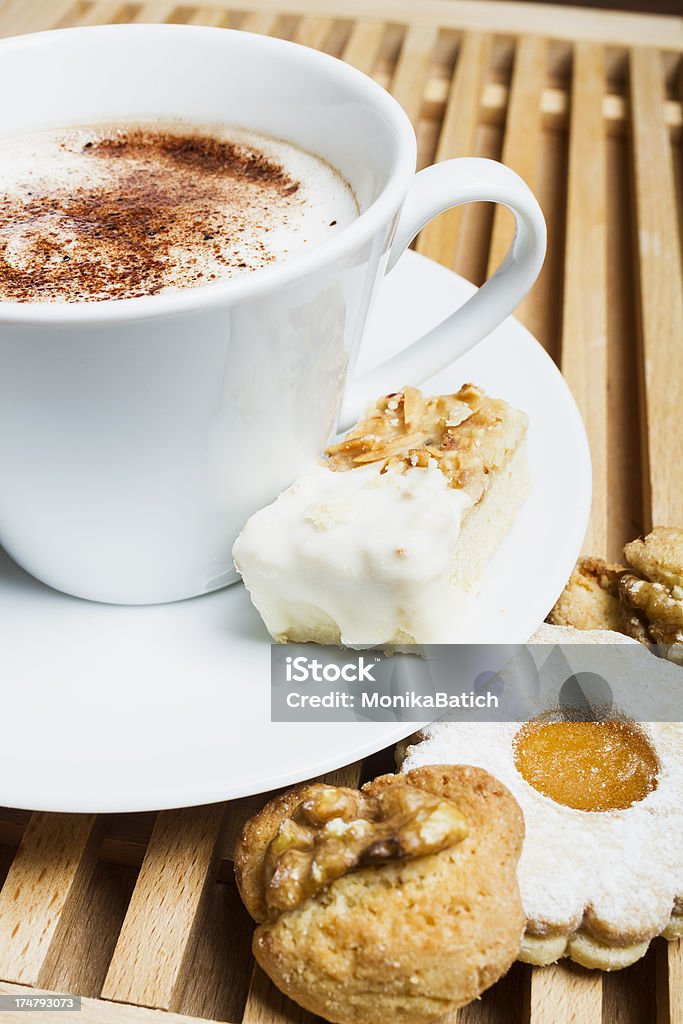 Hot drink and cookies "Hot drink (cocoa, coffee or hot chocolate) with cream. One flash unit used." Breakfast Stock Photo