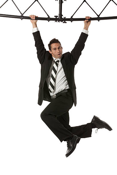 istock Businessman hanging with a metal structure 174793948