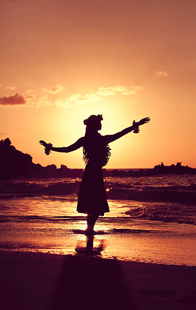 schöne junge hula-tänzer - vertical single flower women teenager stock-fotos und bilder