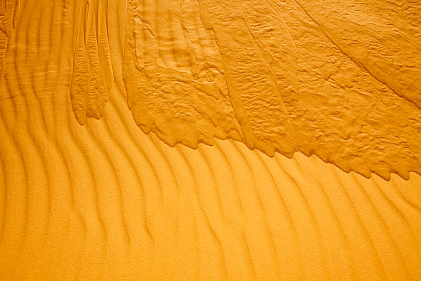 Pattern in sand stock photo