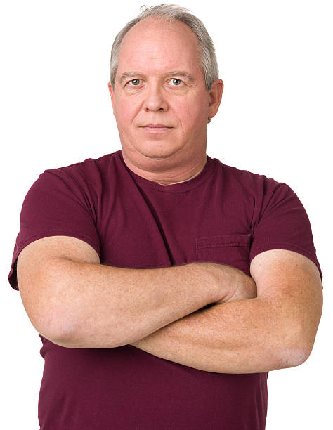Serious Mature Man With Arms Crossed