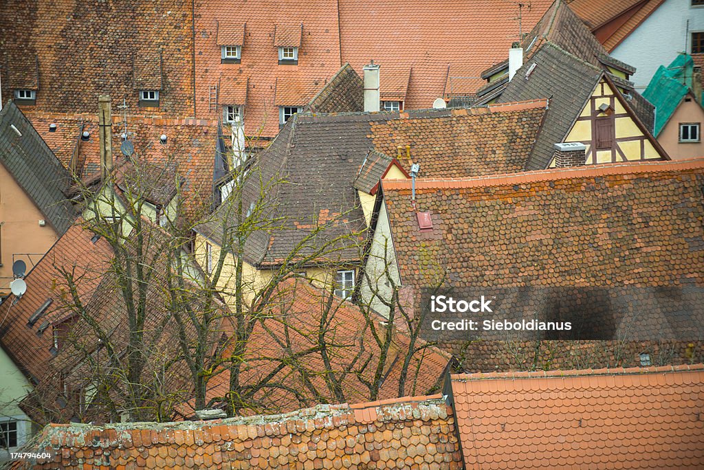 Historic, crooked rooftops with red colored tiles from above. "Historic, crooked rooftops with red colored tiles from above.Rothenburg o. d. Tauber, Germany." Backgrounds Stock Photo