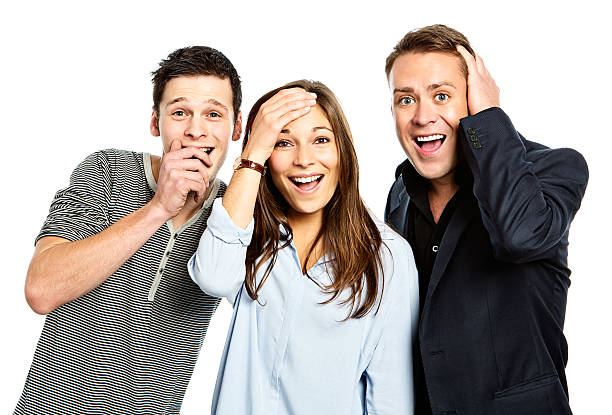 istock Three smiling young people get a wonderful surprise 174794636