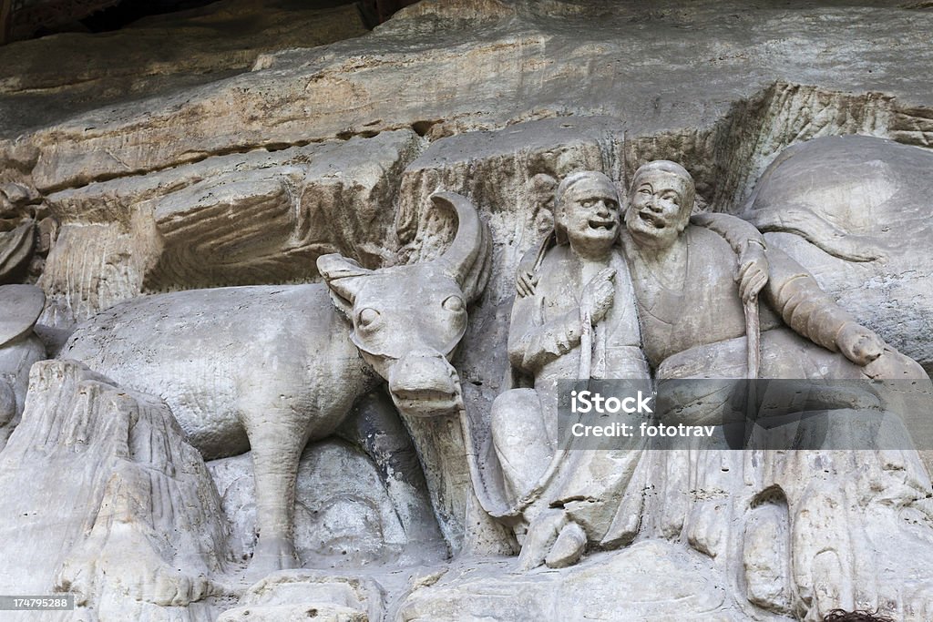 Estatuas budistas en Dazu las esculturas en piedra - Foto de stock de Asia libre de derechos