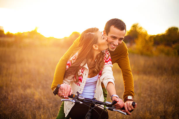 istock Loving couple driving a bicycle 174795583