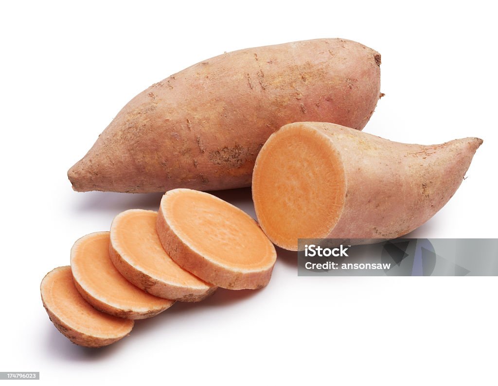 sweet potatoes sweet potatoes with slices isolated on white Sweet Potato Stock Photo