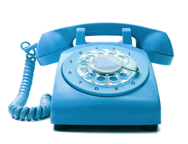 teléfono antiguo - isolated on blue fotografías e imágenes de stock