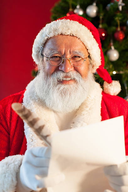 istock Traditional  Santa Claus writing a list 174796266