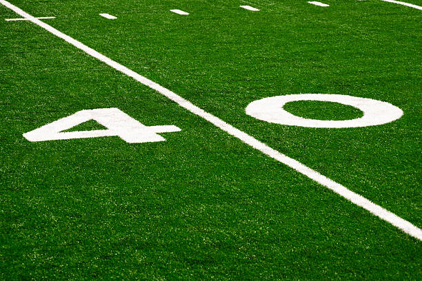 football field 40 yard line bild - forty yard line stock-fotos und bilder