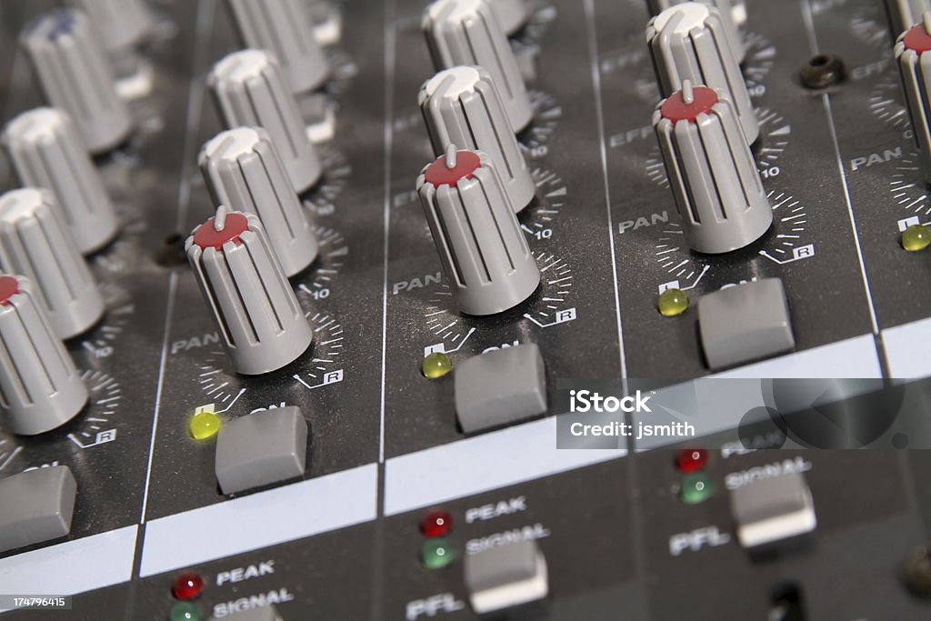 Mixing board close Mixing board close with knobs and buttons Adjusting Stock Photo